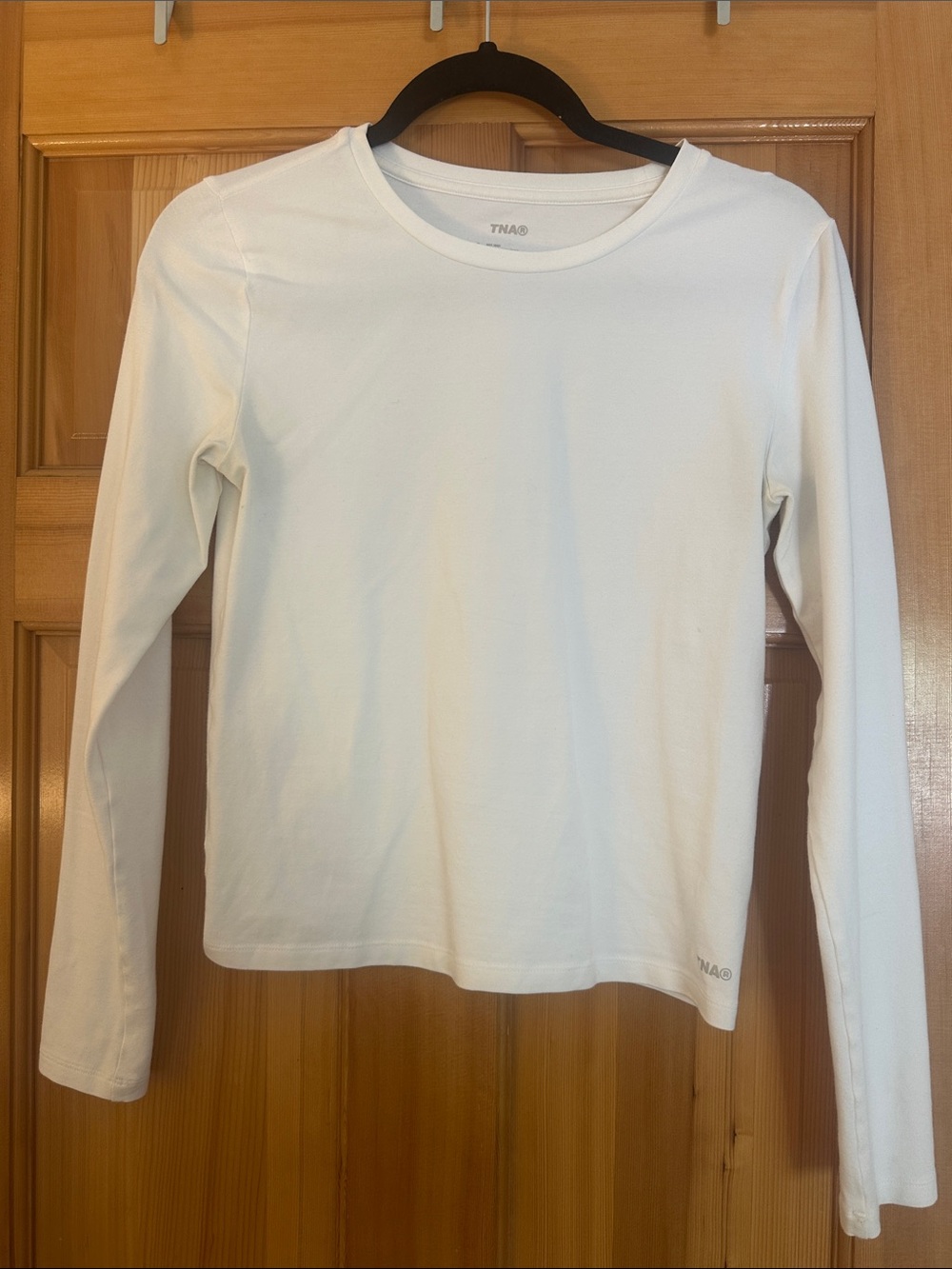 White TNA‎ long-sleeve crewneck top